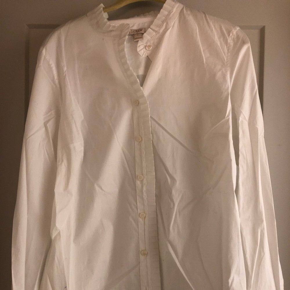 White ruffle blouse